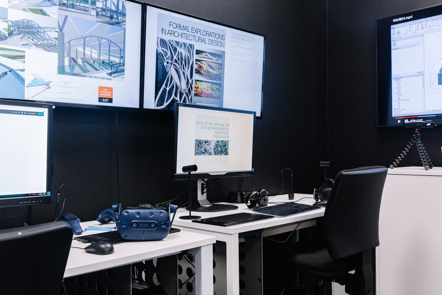 Workstations, VR headset and research displays in the lab at AUT