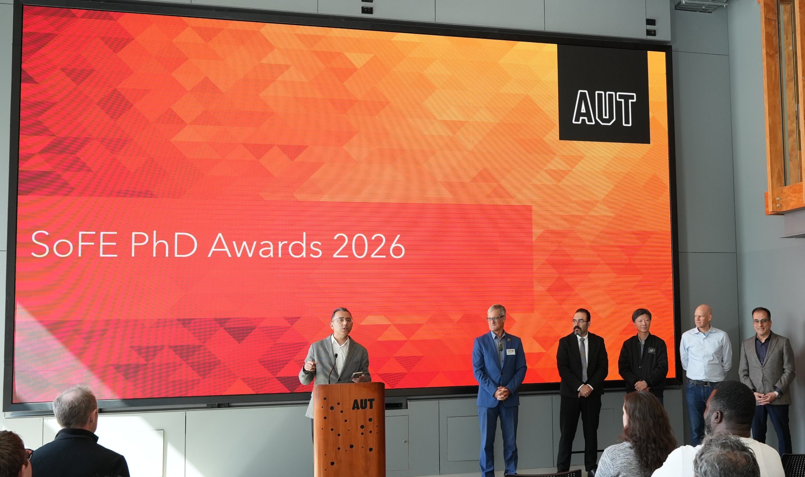 Amir speaks at the School of Future Environments PhD Awards 2026, part of AUT Research Week, celebrating the School's doctoral researchers.