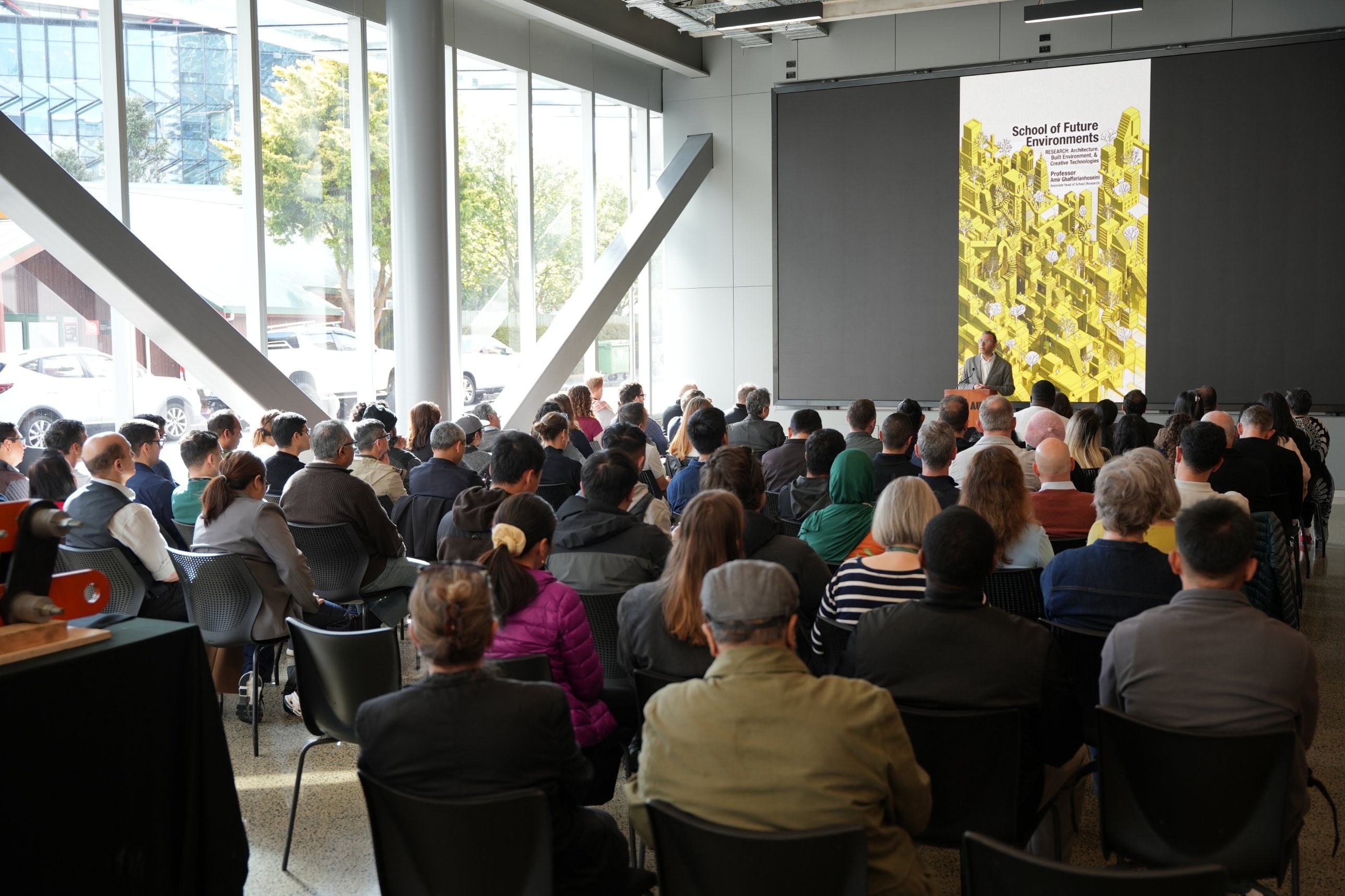 Amir presenting the School of Future Environments research